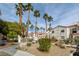 Landscaped grounds with sidewalks, mature trees, and lovely buildings create curb appeal at 1501 Oscar Ct # 101, Las Vegas, NV 89146
