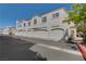 Beautiful exterior of a home with an attached garage and well-manicured landscaping at 1501 Oscar Ct # 101, Las Vegas, NV 89146