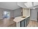 Eat-in kitchen featuring stainless steel appliances, granite counters, and light wood flooring at 1501 Oscar Ct # 101, Las Vegas, NV 89146
