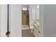 Bathroom featuring tiled shower, toilet, and sink with granite counter at 1569 Hialeah Dr, Las Vegas, NV 89119