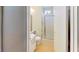 Bathroom featuring tiled shower, toilet, and sink at 1569 Hialeah Dr, Las Vegas, NV 89119
