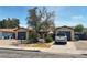 Charming single-story home featuring a well-maintained front yard and a private driveway at 1569 Hialeah Dr, Las Vegas, NV 89119