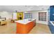 Open floor plan with a kitchen, living room and dining area at 1679 Raindance Way, Las Vegas, NV 89169