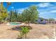 View of the backyard and pool from the side of the property at 1808 Piccolo Way, Las Vegas, NV 89146