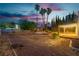 Backyard with pool, patio, and desert landscaping for outdoor entertaining and relaxation at 1808 Piccolo Way, Las Vegas, NV 89146