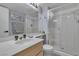 Bathroom with a glass-enclosed shower and a modern single sink vanity at 1808 Piccolo Way, Las Vegas, NV 89146
