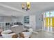 Open-concept dining area near the living room and entryway at 1808 Piccolo Way, Las Vegas, NV 89146