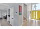 Welcoming entryway featuring a chandelier and a bright yellow door at 1808 Piccolo Way, Las Vegas, NV 89146