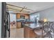 Eat-in kitchen with tile floors, black appliances, and breakfast bar with seating at 1808 Piccolo Way, Las Vegas, NV 89146