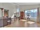 Open living room with hardwood floors, vaulted ceilings, and stylish furniture at 1808 Piccolo Way, Las Vegas, NV 89146
