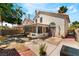 Enjoy outdoor living with a screened porch, brick patio and backyard in a quiet neighborhood, perfect for gatherings at 1922 Falcon Ridge St, Las Vegas, NV 89142