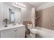 Bathroom featuring a shower, toilet, and vanity with a mirror at 1922 Falcon Ridge St, Las Vegas, NV 89142