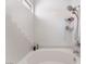 Bathtub featuring white tile and a showerhead at 1922 Falcon Ridge St, Las Vegas, NV 89142