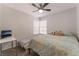 Bedroom with a window and small desk at 1922 Falcon Ridge St, Las Vegas, NV 89142