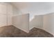 Hallway with carpeted floors and closet for storage at 1922 Falcon Ridge St, Las Vegas, NV 89142