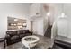 Inviting living room featuring a vaulted ceiling, modern tile floors, and comfortable seating at 1922 Falcon Ridge St, Las Vegas, NV 89142