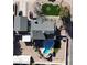 Stunning aerial view of a home with a sparkling pool, lush backyard, and ample parking at 200 E Desert Rose Dr, Henderson, NV 89015