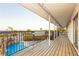 Long deck with a view overlooking the pool below at 200 E Desert Rose Dr, Henderson, NV 89015