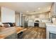Bright kitchen boasts stainless steel appliances, shaker cabinets, and an eat in area at 200 E Desert Rose Dr, Henderson, NV 89015