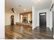 Living room showcases a brick fireplace, hardwood floors, and a classic grandfather clock at 200 E Desert Rose Dr, Henderson, NV 89015