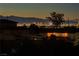 Stunning skyline view at dusk, from a home's outdoor setting at 200 E Desert Rose Dr, Henderson, NV 89015