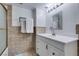 Bathroom featuring a single sink vanity and bathtub-shower at 205 E Harmon Ave # 112, Las Vegas, NV 89169