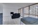 Bedroom with an open floor plan with tiled flooring at 205 E Harmon Ave # 112, Las Vegas, NV 89169