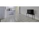 Bright living room with tiled floors and open kitchen pass-through at 205 E Harmon Ave # 112, Las Vegas, NV 89169