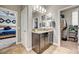 Bathroom with granite countertops, dual sinks, and adjacent walk-in closet at 2159 Morro Vista Dr, Las Vegas, NV 89135