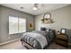 Cozy bedroom with ceiling fan, natural light, and neutral tones at 2159 Morro Vista Dr, Las Vegas, NV 89135