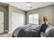 Comfortable bedroom with large closet and a ceiling fan at 2159 Morro Vista Dr, Las Vegas, NV 89135