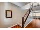 Staircase with hardwood floors and modern metal railing at 2159 Morro Vista Dr, Las Vegas, NV 89135