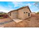 Backyard space featuring low maintenance desert landscaping and a patio area for outdoor living at 2319 Little Italy Ave, North Las Vegas, NV 89031