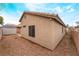 Exterior rear view of the home showing the spacious backyard and shed at 2319 Little Italy Ave, North Las Vegas, NV 89031