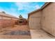View of the backyard with a patio and rock landscaping at 2319 Little Italy Ave, North Las Vegas, NV 89031