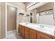Bright bathroom features a double sink vanity with modern fixtures and a large mirror at 2319 Little Italy Ave, North Las Vegas, NV 89031