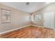 Spacious living room with hardwood floors, ample lighting and neutral paint at 2319 Little Italy Ave, North Las Vegas, NV 89031