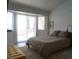 Bright bedroom with glass sliding door access to the yard, offering lots of light at 2874 Tori Way, Henderson, NV 89074