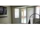 Bright bedroom with sliding glass doors overlooking a pool, offering a tranquil retreat at 2874 Tori Way, Henderson, NV 89074