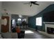 Open-concept living area with fireplace, kitchen view, and a seamless flow for entertaining at 2874 Tori Way, Henderson, NV 89074
