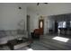 Spacious living room featuring modern decor, hardwood floors, and an open layout at 2874 Tori Way, Henderson, NV 89074