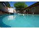 Relax in this backyard pool with clear water and desert landscaping at 2874 Tori Way, Henderson, NV 89074