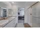 Well-lit bathroom with double vanity, granite countertops, and a separate shower at 387 Larksong Ave, Henderson, NV 89011