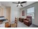 Bedroom features chair, closet, ceiling fan, desk and natural light at 387 Larksong Ave, Henderson, NV 89011
