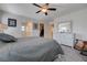 Well-lit bedroom features neutral decor and a large dresser at 387 Larksong Ave, Henderson, NV 89011