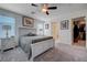 Spacious bedroom with natural light, ensuite bathroom, and walk-in closet at 387 Larksong Ave, Henderson, NV 89011