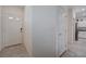 Inviting foyer with tile flooring leading to the kitchen at 387 Larksong Ave, Henderson, NV 89011