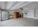 Spacious three car garage featuring a sauna and plenty of room for storage at 387 Larksong Ave, Henderson, NV 89011