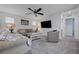 Upstairs living room with neutral paint, carpet flooring, and plenty of natural light at 387 Larksong Ave, Henderson, NV 89011