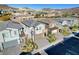 Beautiful aerial view of a residential neighborhood showcasing modern homes with well-manicured landscaping at 40 Strada Moscato, Henderson, NV 89011